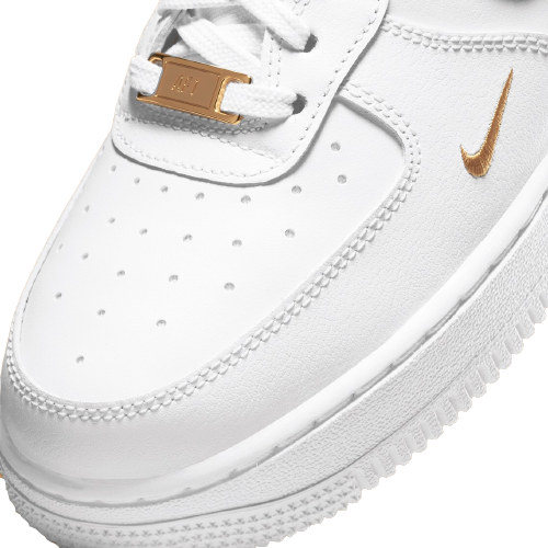 The Nike WMNS Air Force 1 07 Essential has gold details ...