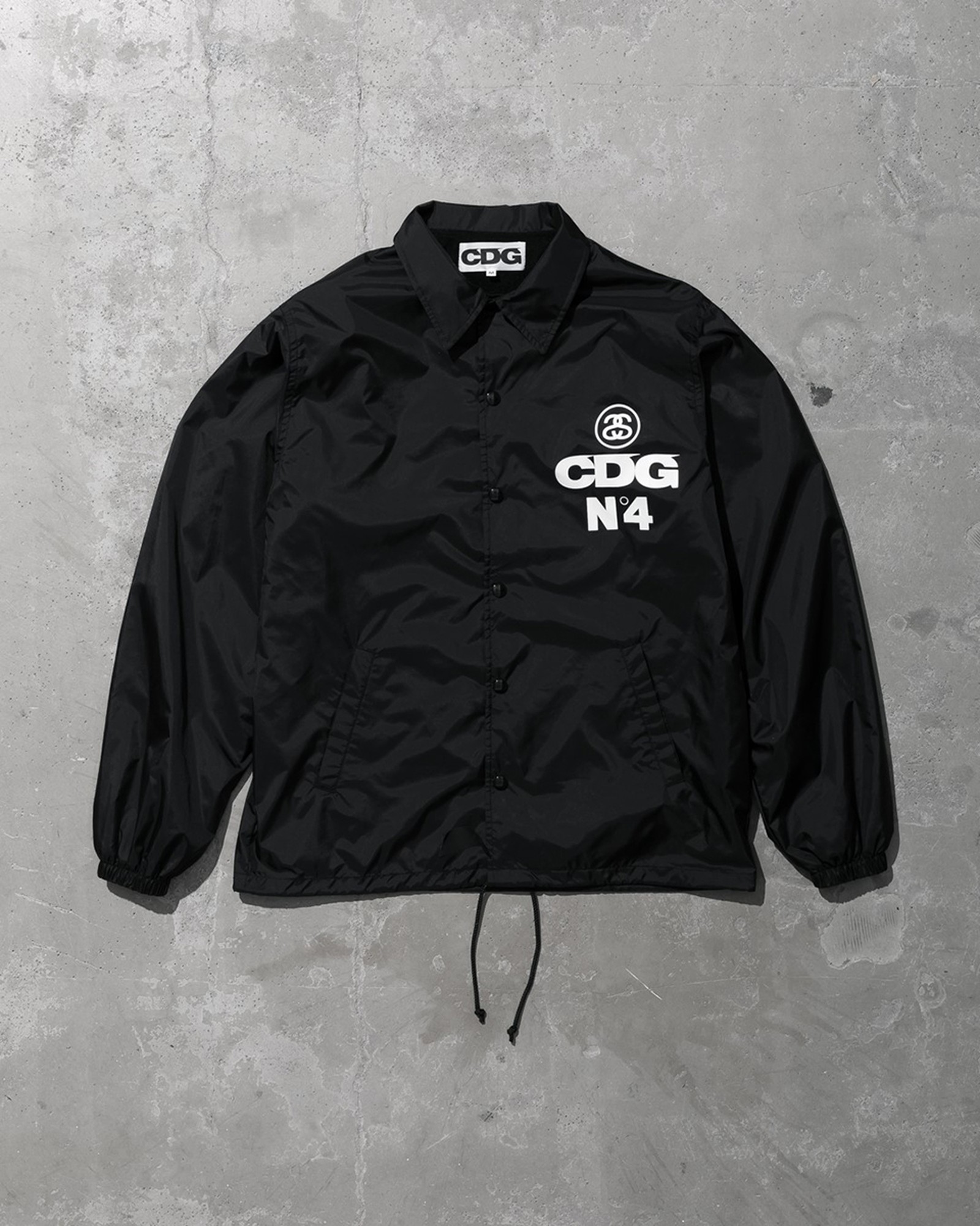 Stüssy x CDG Coaches jacket front