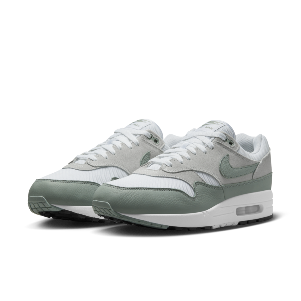 pair of air max 1 mica green sneakers