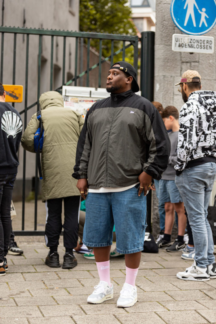 patta air max 1 white the wave store opening man wearing sneakers