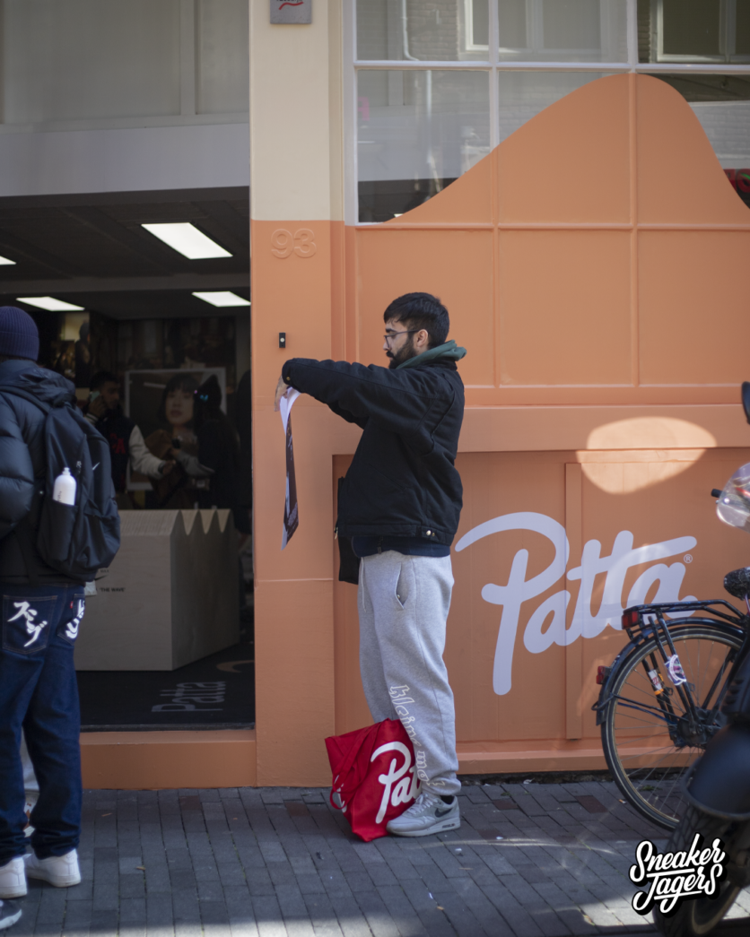 outside patta amsterdam for patta x nike air max 1 monarch the wave release - man queuing