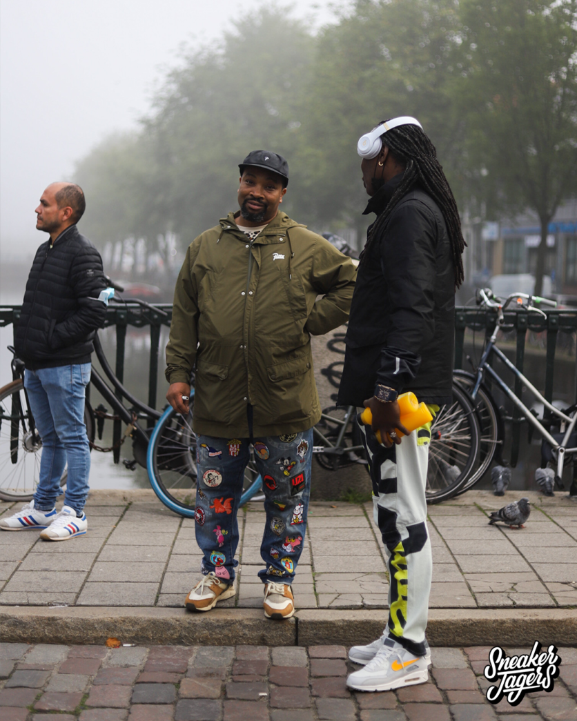 outside patta amsterdam for patta x nike air max 1 monarch the wave release - people chatting