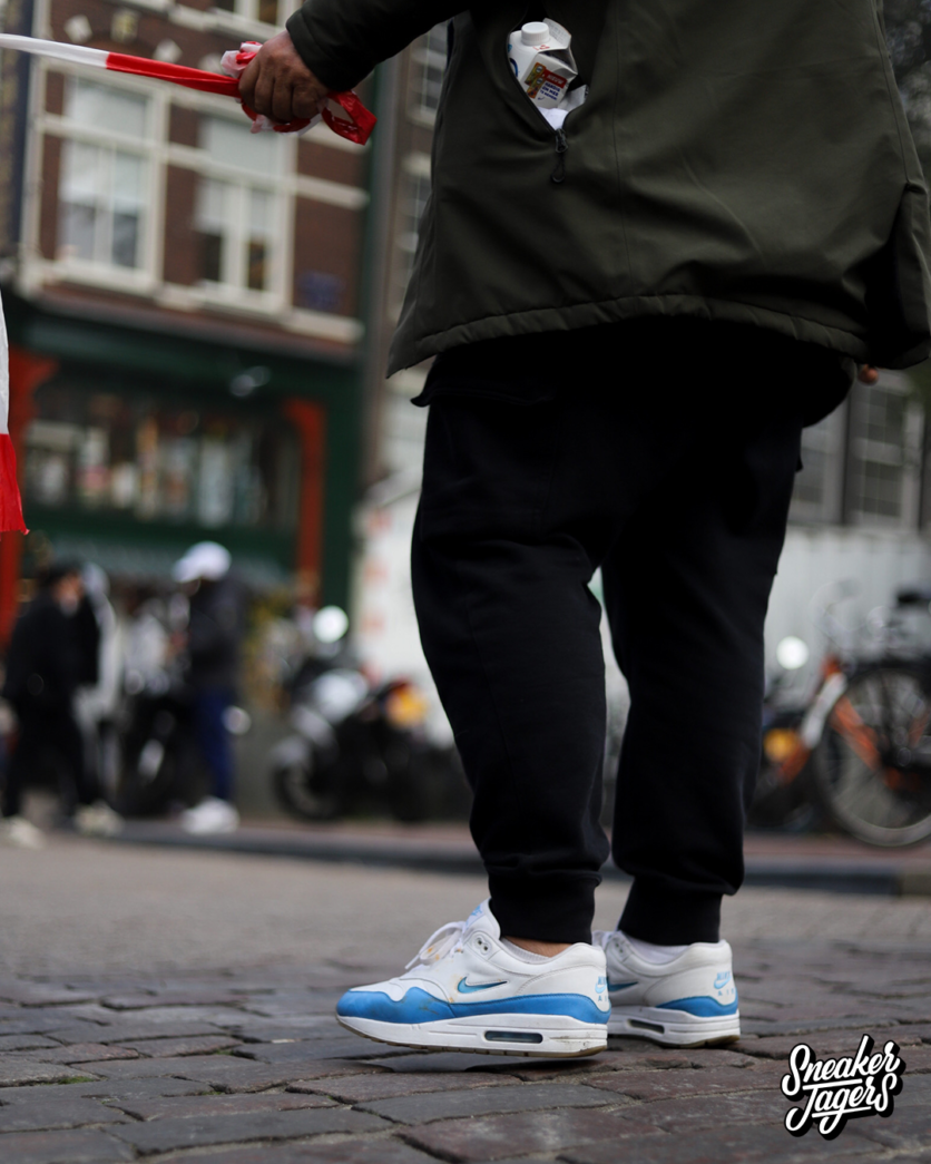 outside patta amsterdam for patta x nike air max 1 monarch the wave release - wearing the aqua release