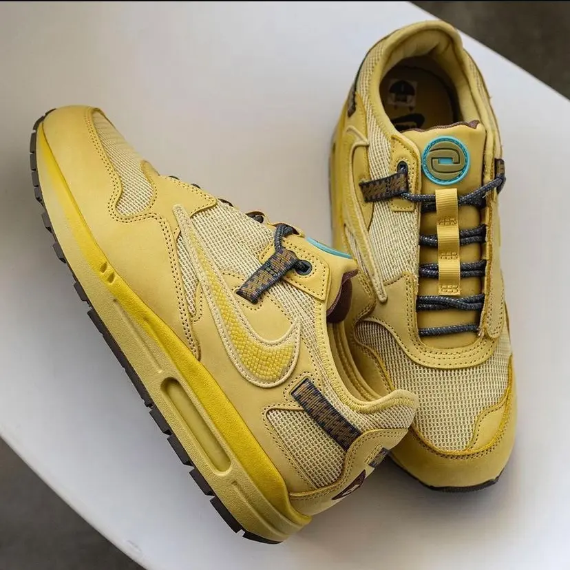 Travis Scott x Nike Saturn Gold flat view