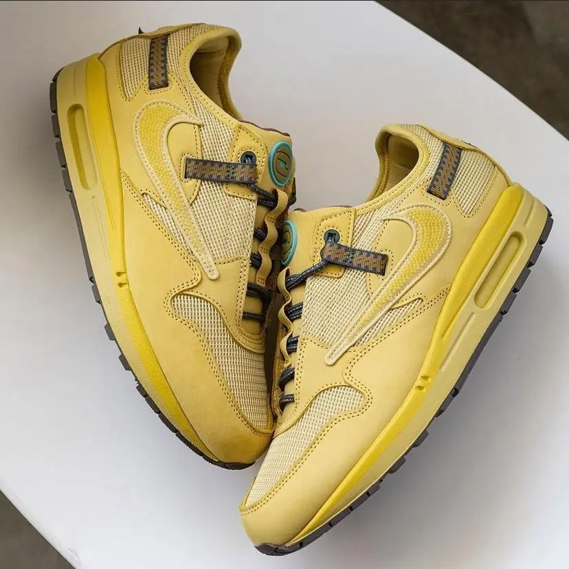 Travis Scott x Nike Saturn Gold side views