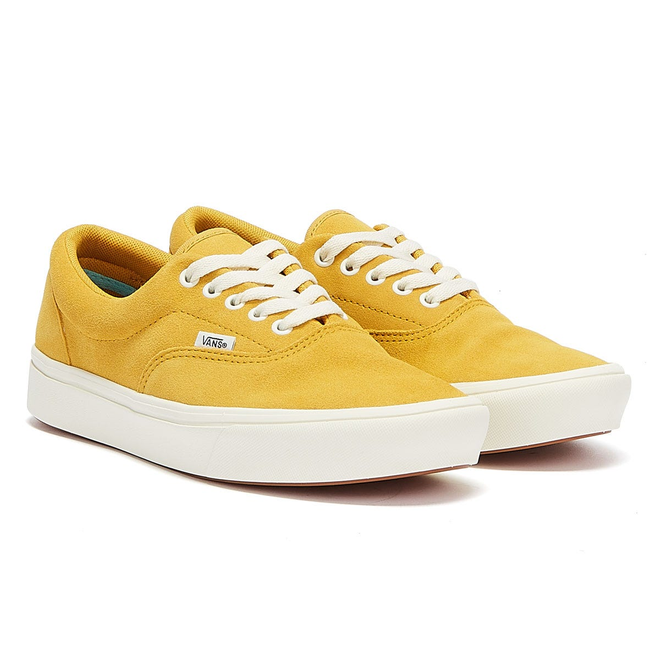gold and white vans