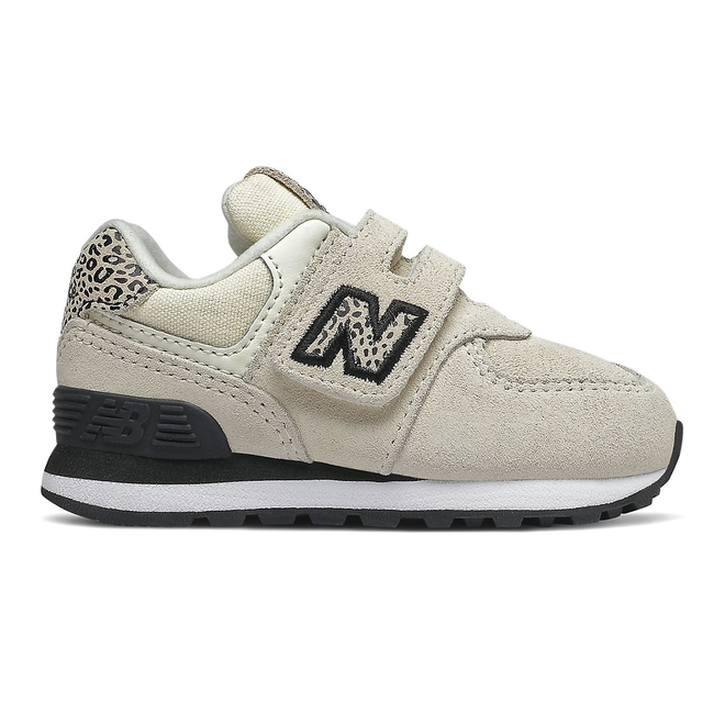 new balance 574 animal print trainers in black