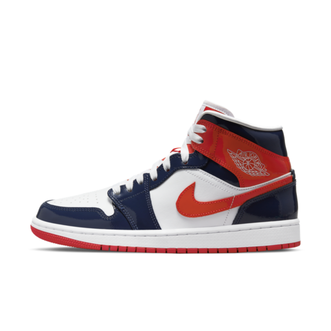 dark blue and orange jordans