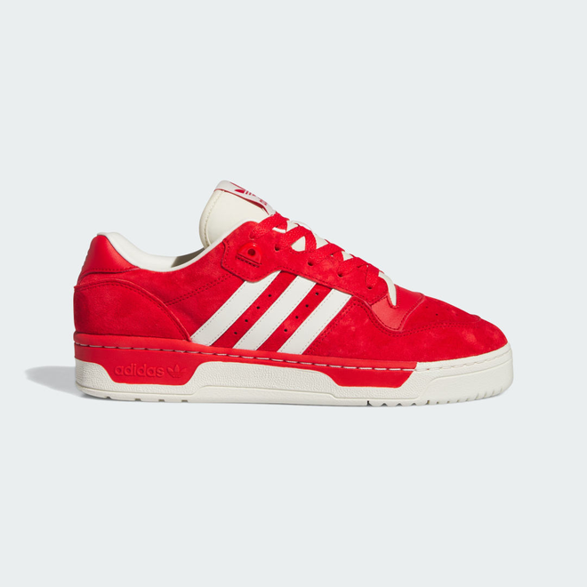 Adidas originals rivalry low sneakers hotsell in triple white